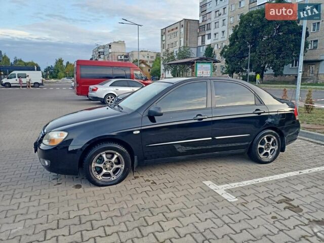 Черный Киа Черато, объемом двигателя 1.59 л и пробегом 208 тыс. км за 3800 $, фото 1 на Automoto.ua