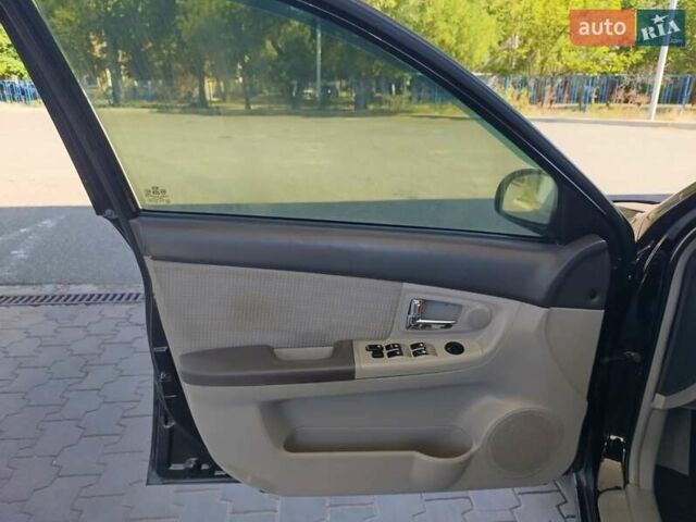 Черный Киа Черато, объемом двигателя 1.59 л и пробегом 219 тыс. км за 4600 $, фото 27 на Automoto.ua