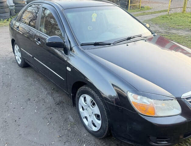 Чорний Кіа Черато, об'ємом двигуна 1.59 л та пробігом 250 тис. км за 4300 $, фото 21 на Automoto.ua