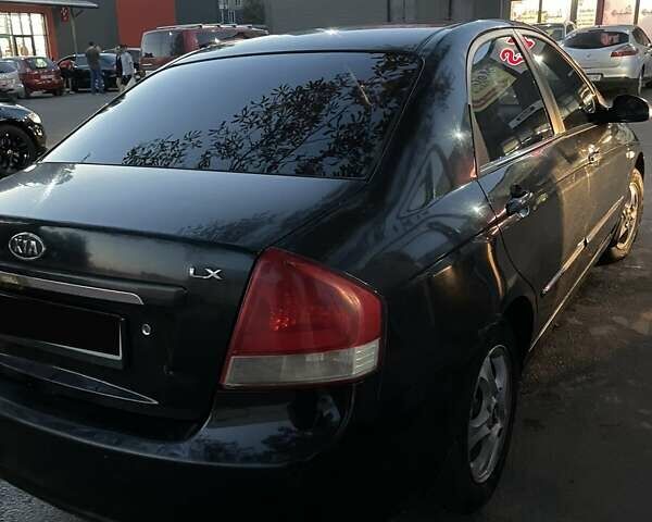 Черный Киа Черато, объемом двигателя 1.59 л и пробегом 273 тыс. км за 4200 $, фото 8 на Automoto.ua