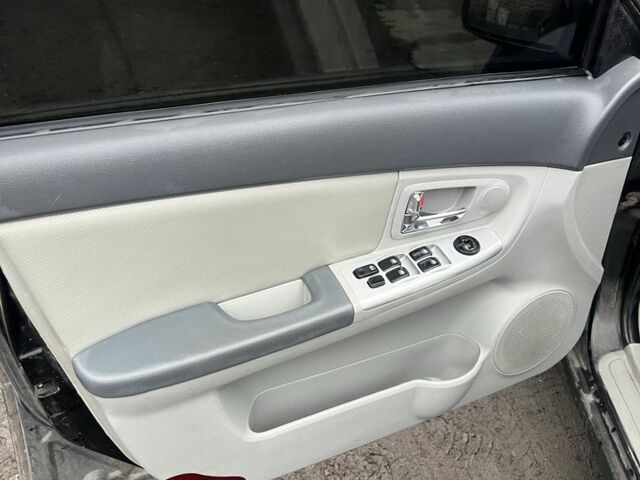 Черный Киа Черато, объемом двигателя 1.6 л и пробегом 3 тыс. км за 3500 $, фото 2 на Automoto.ua