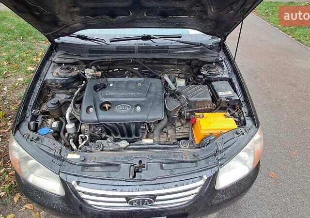 Черный Киа Черато, объемом двигателя 1.59 л и пробегом 349 тыс. км за 4000 $, фото 3 на Automoto.ua