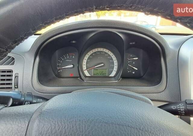 Черный Киа Черато, объемом двигателя 1.59 л и пробегом 349 тыс. км за 4000 $, фото 5 на Automoto.ua