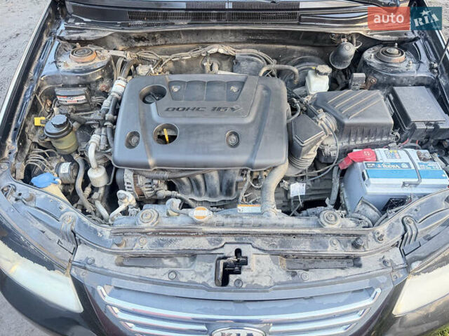 Чорний Кіа Черато, об'ємом двигуна 1.59 л та пробігом 250 тис. км за 4300 $, фото 18 на Automoto.ua