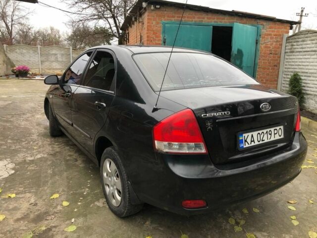 Черный Киа Черато, объемом двигателя 1.6 л и пробегом 240 тыс. км за 3300 $, фото 4 на Automoto.ua