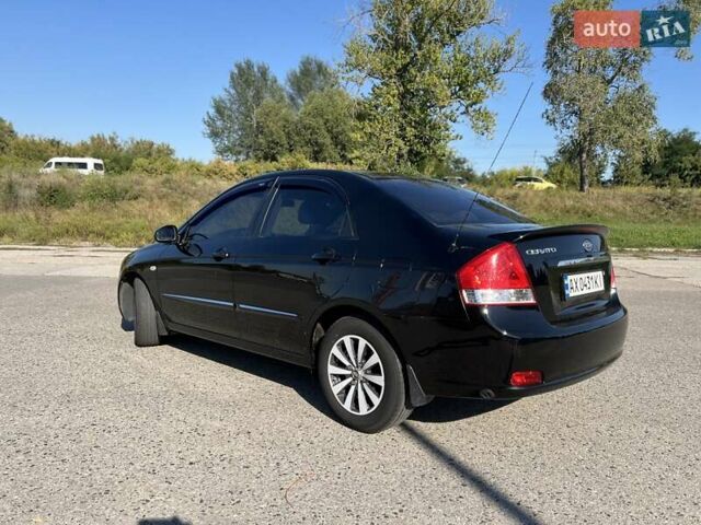 Чорний Кіа Черато, об'ємом двигуна 1.98 л та пробігом 163 тис. км за 5500 $, фото 3 на Automoto.ua