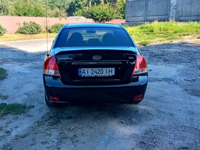 Чорний Кіа Черато, об'ємом двигуна 2 л та пробігом 203 тис. км за 5500 $, фото 3 на Automoto.ua