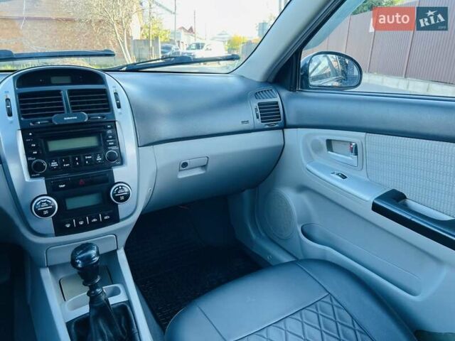 Киа Черато 2007 в Черновцах на Automoto.ua Черный Киа Черато, объемом двигателя 1.6 л и пробегом 210 тыс. км за 3950 $, фото 48 на Automoto.ua