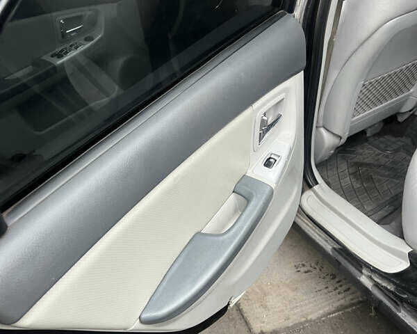 Черный Киа Черато, объемом двигателя 1.58 л и пробегом 355 тыс. км за 3500 $, фото 13 на Automoto.ua