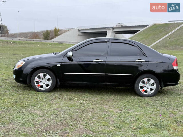 Черный Киа Черато, объемом двигателя 1.59 л и пробегом 312 тыс. км за 3000 $, фото 1 на Automoto.ua