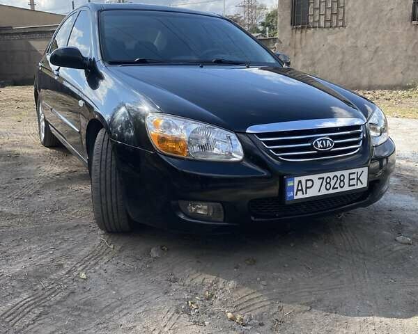 Чорний Кіа Черато, об'ємом двигуна 1.6 л та пробігом 157 тис. км за 5800 $, фото 2 на Automoto.ua