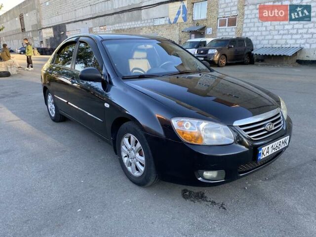 Черный Киа Черато, объемом двигателя 1.98 л и пробегом 335 тыс. км за 4100 $, фото 7 на Automoto.ua