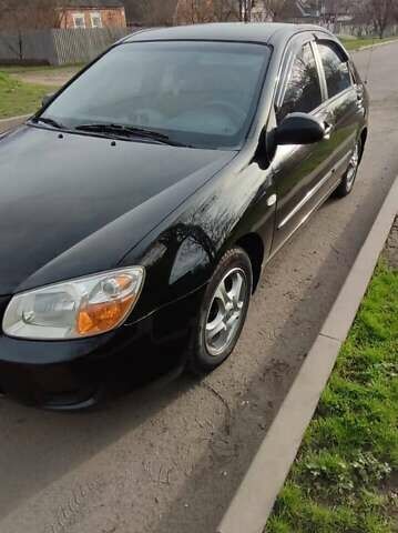 Черный Киа Черато, объемом двигателя 1.59 л и пробегом 273 тыс. км за 4200 $, фото 4 на Automoto.ua