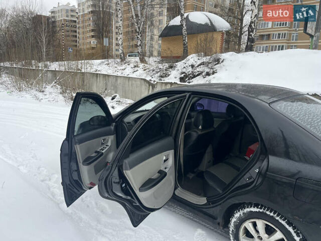 Черный Киа Черато, объемом двигателя 1.59 л и пробегом 243 тыс. км за 2900 $, фото 19 на Automoto.ua