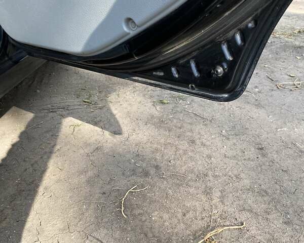 Чорний Кіа Черато, об'ємом двигуна 1.6 л та пробігом 157 тис. км за 5800 $, фото 9 на Automoto.ua