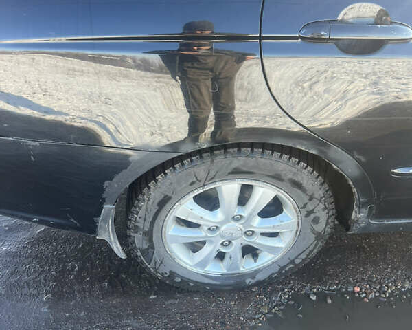 Черный Киа Черато, объемом двигателя 1.58 л и пробегом 355 тыс. км за 3500 $, фото 3 на Automoto.ua