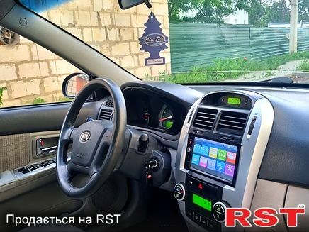 Черный Киа Черато, объемом двигателя 1.6 л и пробегом 185 тыс. км за 4200 $, фото 1 на Automoto.ua