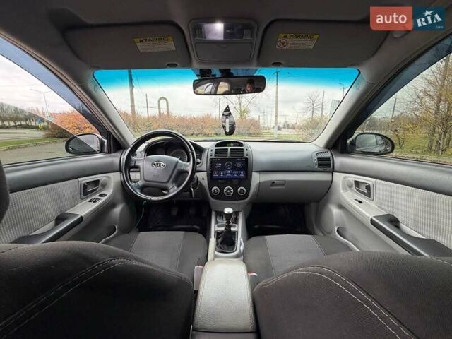 Чорний Кіа Черато, об'ємом двигуна 1.6 л та пробігом 224 тис. км за 4900 $, фото 38 на Automoto.ua