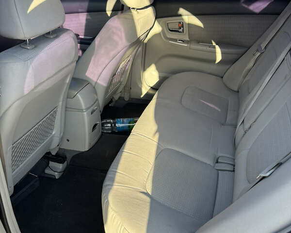 Черный Киа Черато, объемом двигателя 1.59 л и пробегом 314 тыс. км за 5000 $, фото 7 на Automoto.ua