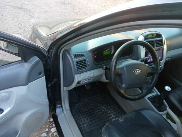 Черный Киа Черато, объемом двигателя 1.6 л и пробегом 129 тыс. км за 3300 $, фото 3 на Automoto.ua