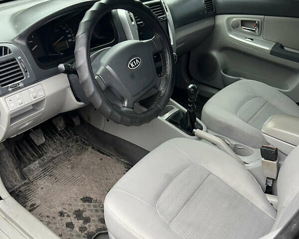 Черный Киа Черато, объемом двигателя 1.58 л и пробегом 355 тыс. км за 3500 $, фото 11 на Automoto.ua