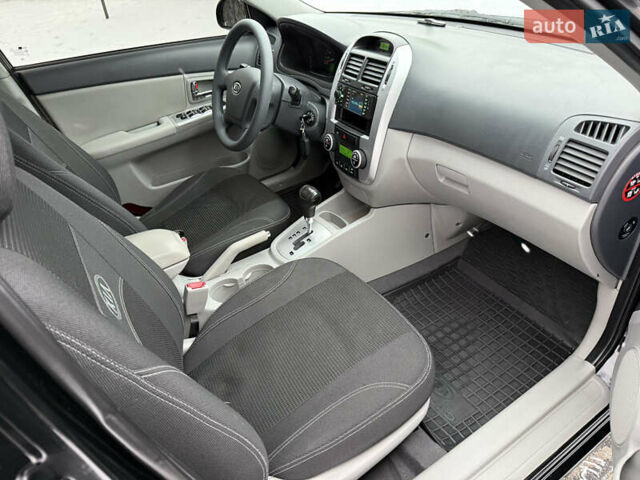 Черный Киа Черато, объемом двигателя 1.98 л и пробегом 183 тыс. км за 5999 $, фото 21 на Automoto.ua