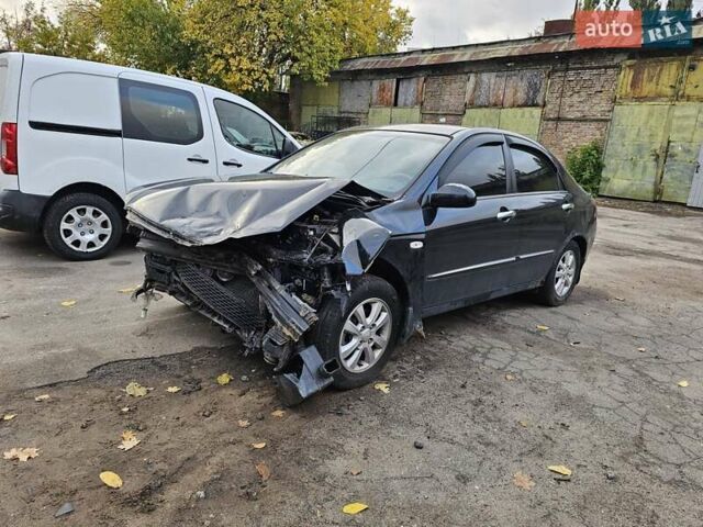 Чорний Кіа Черато, об'ємом двигуна 1.59 л та пробігом 200 тис. км за 1350 $, фото 1 на Automoto.ua