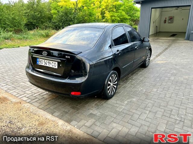 Черный Киа Черато, объемом двигателя 1.6 л и пробегом 187 тыс. км за 4999 $, фото 3 на Automoto.ua