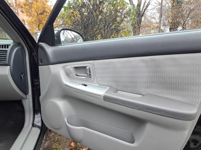 Черный Киа Черато, объемом двигателя 1.6 л и пробегом 258 тыс. км за 4300 $, фото 17 на Automoto.ua