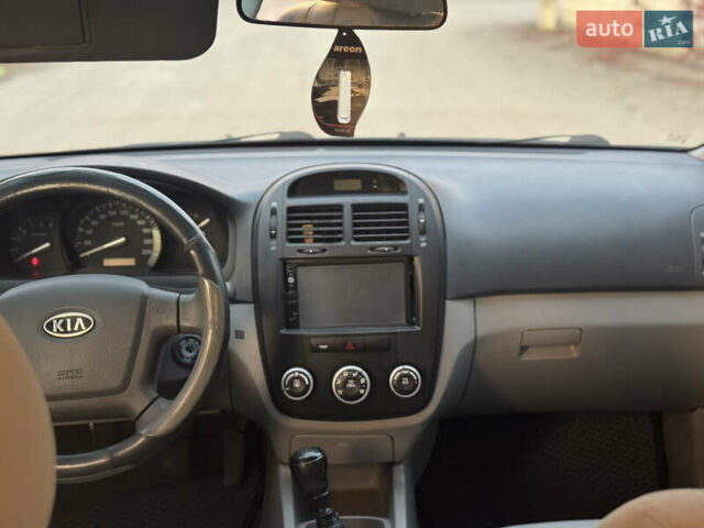 Черный Киа Черато, объемом двигателя 1.6 л и пробегом 235 тыс. км за 4900 $, фото 10 на Automoto.ua