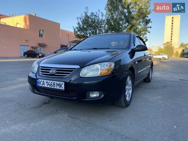 Черный Киа Черато, объемом двигателя 1.98 л и пробегом 335 тыс. км за 4100 $, фото 1 на Automoto.ua