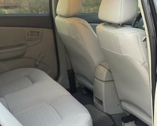 Черный Киа Черато, объемом двигателя 1.6 л и пробегом 235 тыс. км за 4900 $, фото 9 на Automoto.ua