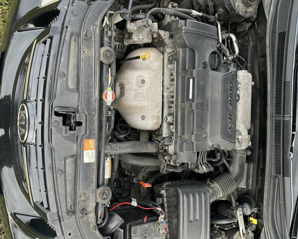 Черный Киа Черато, объемом двигателя 1.98 л и пробегом 315 тыс. км за 5745 $, фото 11 на Automoto.ua