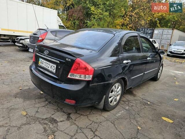 Чорний Кіа Черато, об'ємом двигуна 1.59 л та пробігом 200 тис. км за 1350 $, фото 7 на Automoto.ua