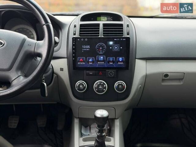 Чорний Кіа Черато, об'ємом двигуна 1.6 л та пробігом 224 тис. км за 4900 $, фото 41 на Automoto.ua