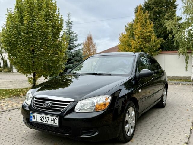Чорний Кіа Черато, об'ємом двигуна 1.6 л та пробігом 320 тис. км за 3500 $, фото 1 на Automoto.ua