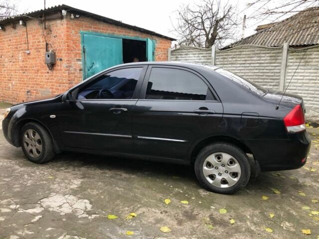 Черный Киа Черато, объемом двигателя 1.6 л и пробегом 240 тыс. км за 3300 $, фото 3 на Automoto.ua