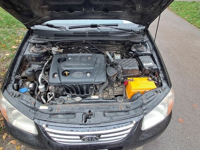 Черный Киа Черато, объемом двигателя 1.6 л и пробегом 258 тыс. км за 4300 $, фото 11 на Automoto.ua