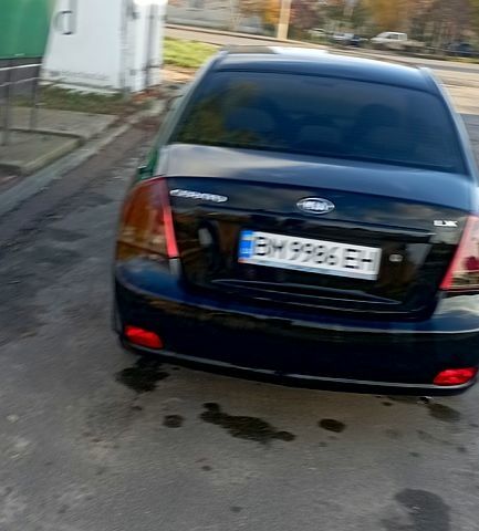 Кіа Черато 2007 у Сумах на Automoto.ua Чорний Кіа Черато, об'ємом двигуна 1.6 л та пробігом 221 тис. км за 4500 $, фото 4 на Automoto.ua