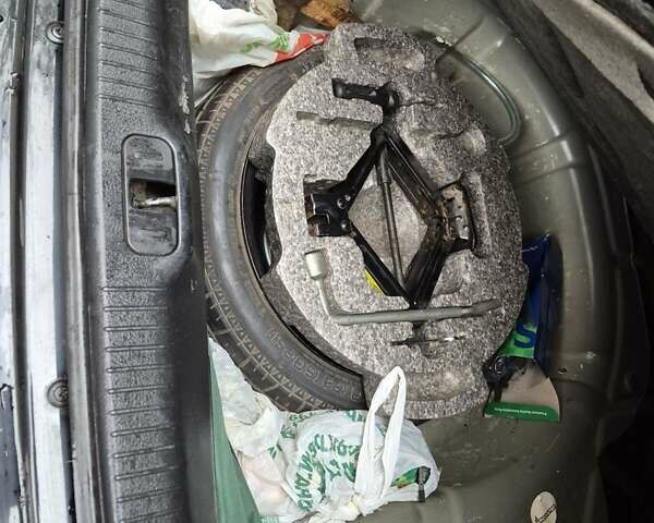 Черный Киа Черато, объемом двигателя 1.98 л и пробегом 180 тыс. км за 4500 $, фото 5 на Automoto.ua