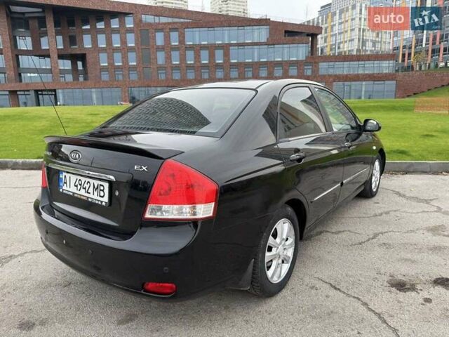 Черный Киа Черато, объемом двигателя 1.6 л и пробегом 232 тыс. км за 3850 $, фото 7 на Automoto.ua