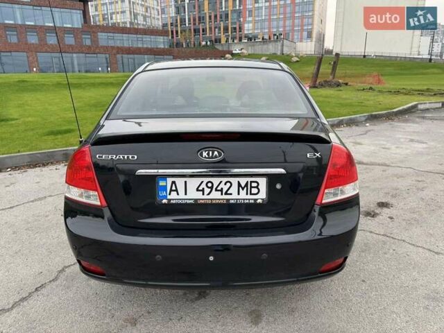 Черный Киа Черато, объемом двигателя 1.6 л и пробегом 232 тыс. км за 3850 $, фото 2 на Automoto.ua