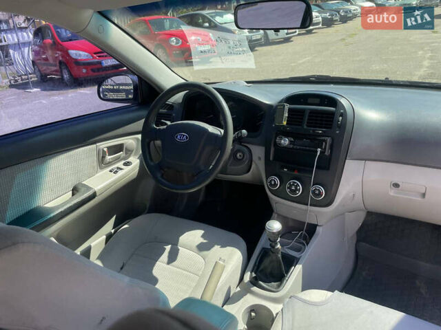 Черный Киа Черато, объемом двигателя 1.59 л и пробегом 210 тыс. км за 4100 $, фото 6 на Automoto.ua