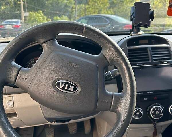 Черный Киа Черато, объемом двигателя 1.59 л и пробегом 273 тыс. км за 4200 $, фото 10 на Automoto.ua