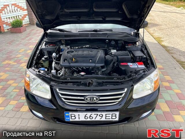 Черный Киа Черато, объемом двигателя 1.6 л и пробегом 190 тыс. км за 4350 $, фото 4 на Automoto.ua