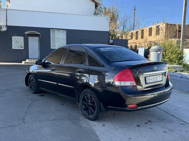 Чорний Кіа Черато, об'ємом двигуна 2 л та пробігом 362 тис. км за 3900 $, фото 2 на Automoto.ua