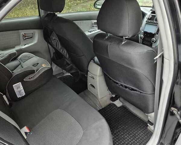 Черный Киа Черато, объемом двигателя 1.98 л и пробегом 180 тыс. км за 4500 $, фото 24 на Automoto.ua