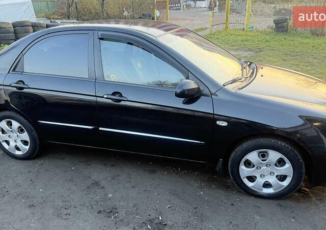 Чорний Кіа Черато, об'ємом двигуна 1.59 л та пробігом 250 тис. км за 4300 $, фото 13 на Automoto.ua