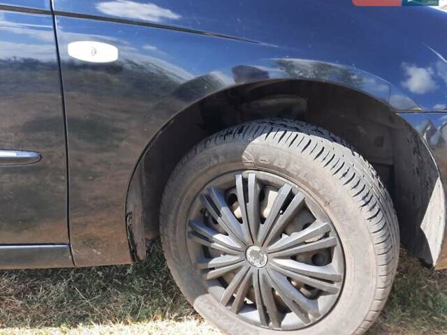 Черный Киа Черато, объемом двигателя 1.6 л и пробегом 277 тыс. км за 4200 $, фото 5 на Automoto.ua