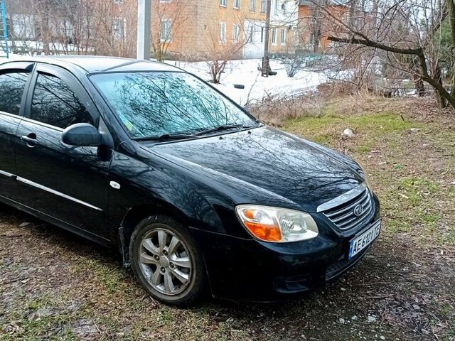 Чорний Кіа Черато, об'ємом двигуна 1.6 л та пробігом 215 тис. км за 3900 $, фото 2 на Automoto.ua